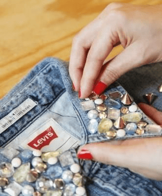 embellish a collar with studs and jewels