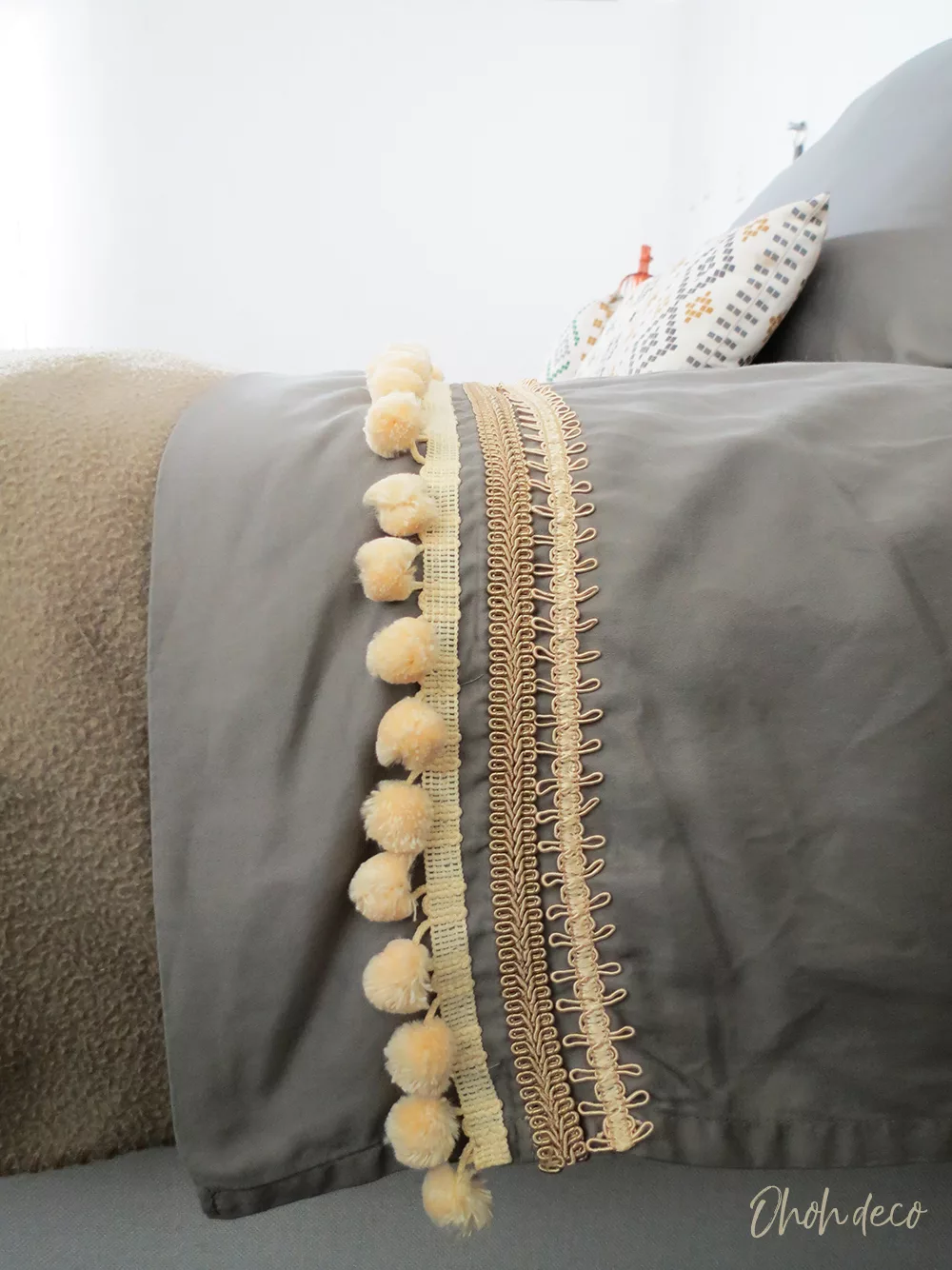 bed sheets upgrade with pom poms 