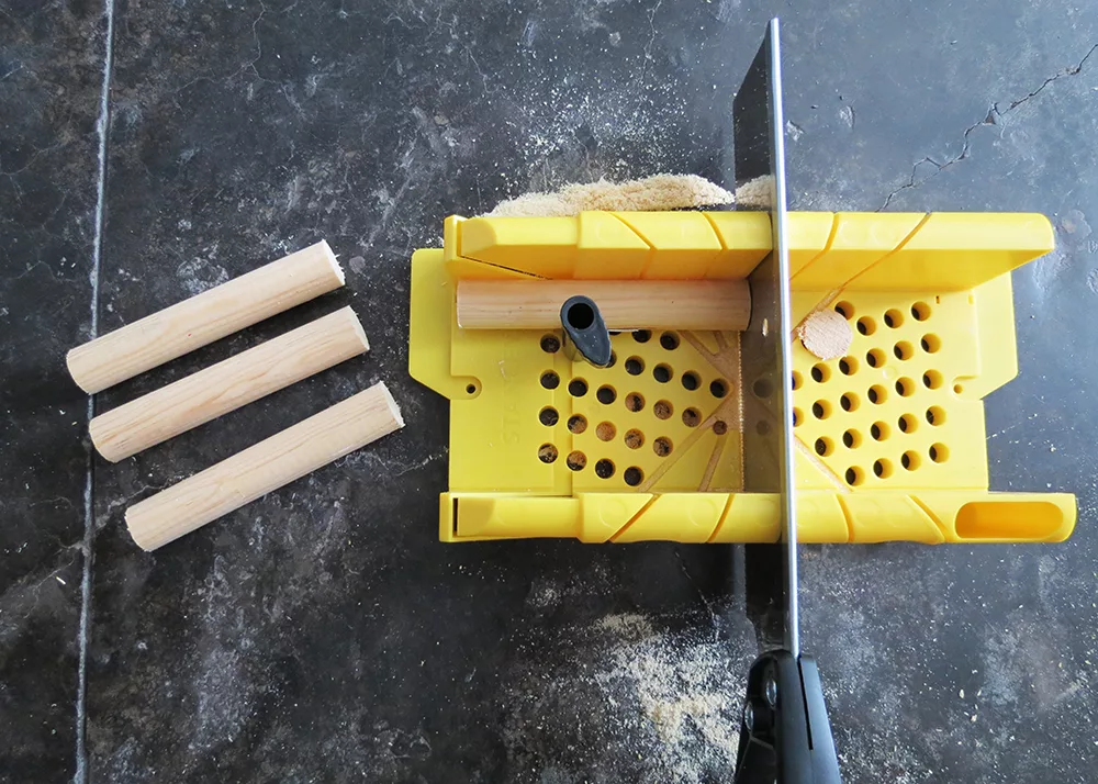 cutting legs for upcycled bookshelf 