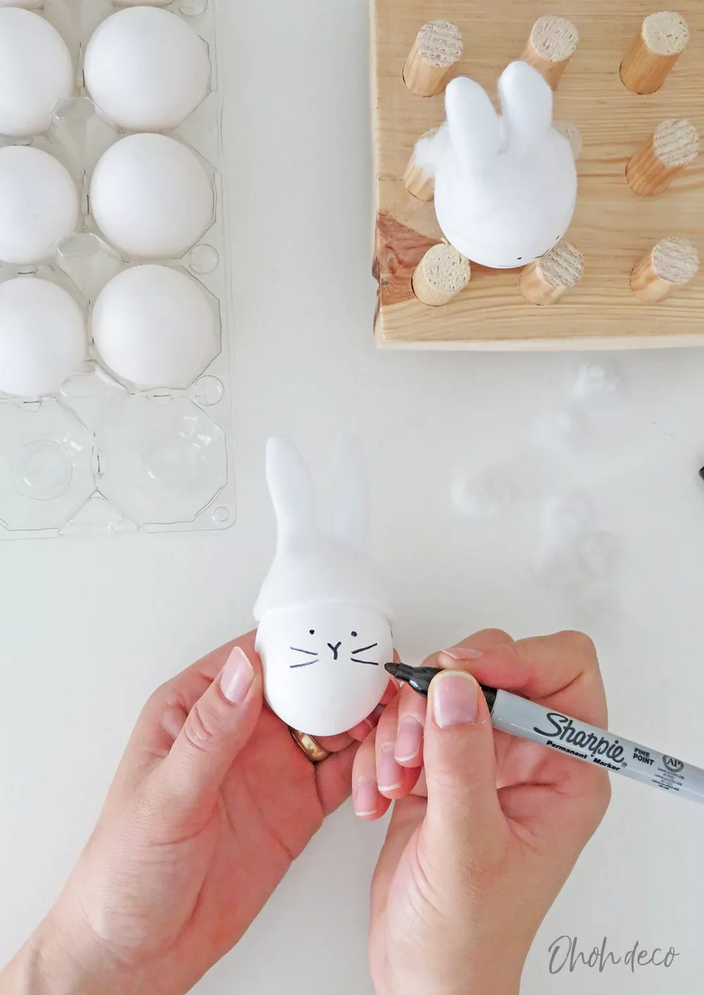drawing a bunny face on egg