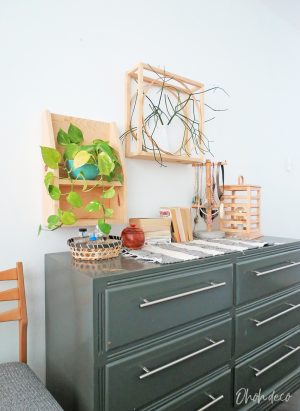 An easy DIY to build a geometric display shelf using embroidery loops and wood trim. #diyshelf #storage #displayshelf #wallshelf #homedecor #diy