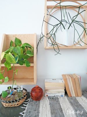 An easy DIY to build a geometric display shelf using embroidery loops and wood trim. #diyshelf #storage #displayshelf #wallshelf #homedecor #diy