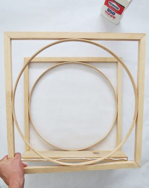 An easy DIY to build a geometric display shelf using embroidery loops and wood trim. #diyshelf #storage #displayshelf #wallshelf #homedecor #diy