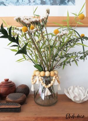 Recycled glass jar as flower vase