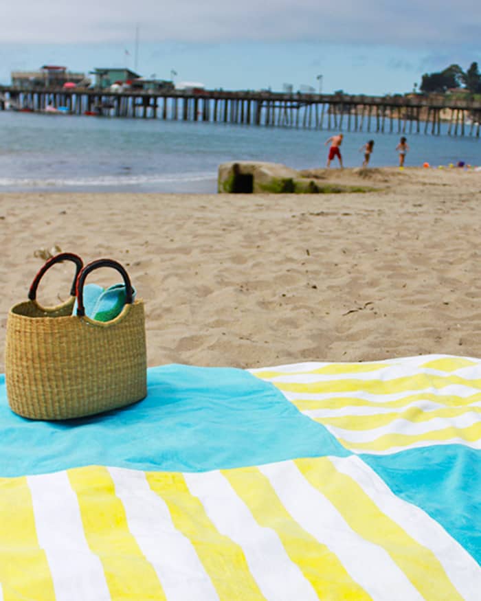 make a giant towel blanket for the beach