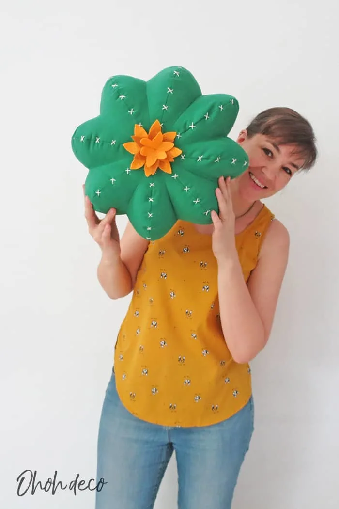 cactus shaped pillow and person