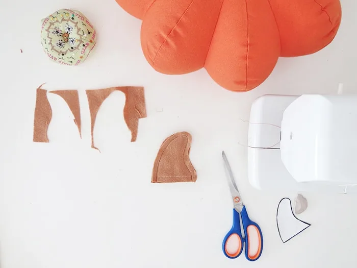 sew the stem for pumpkin shaped pillow