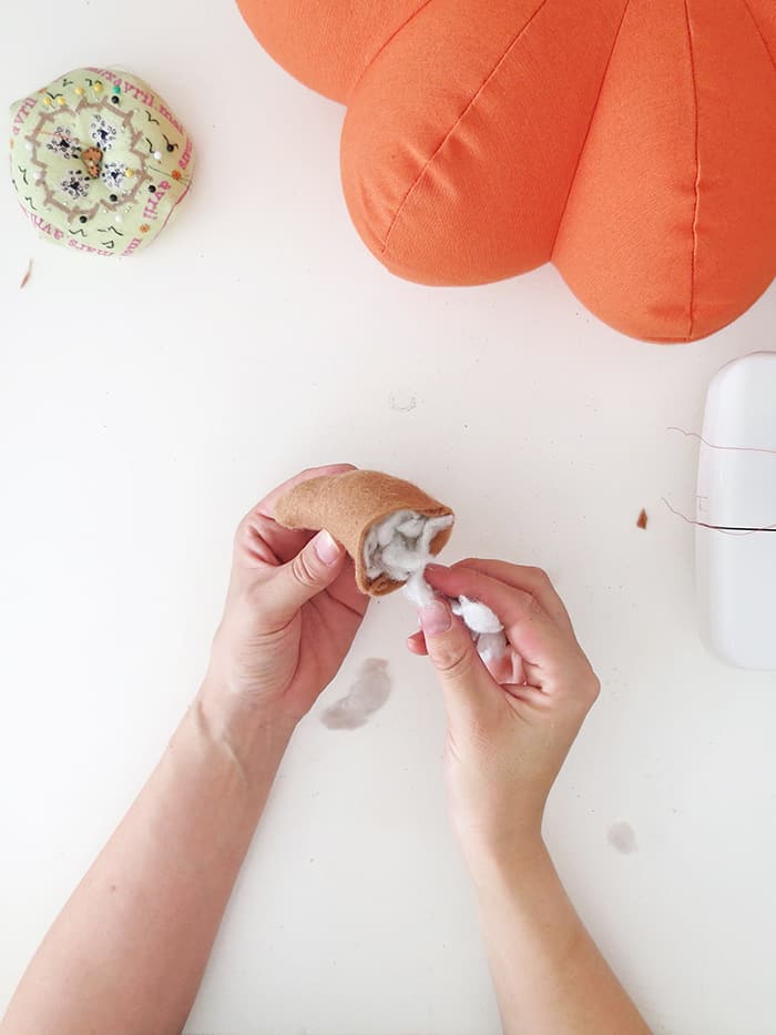 fill the stem of the pumpkin pillow