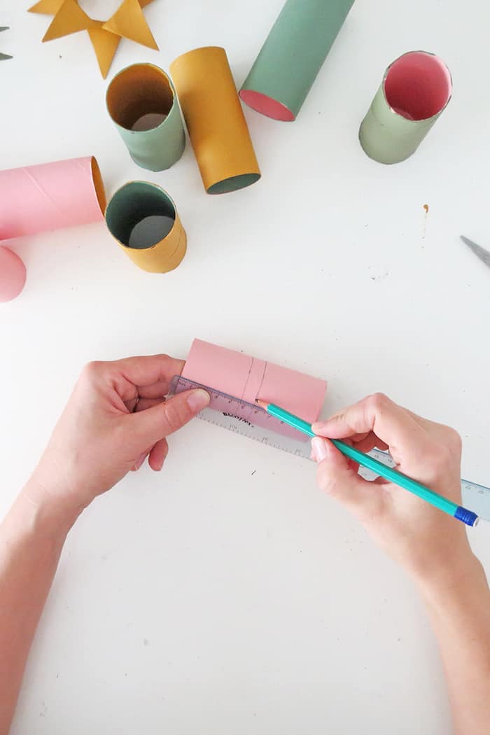 mark toilet roll center to make christmas ornaments