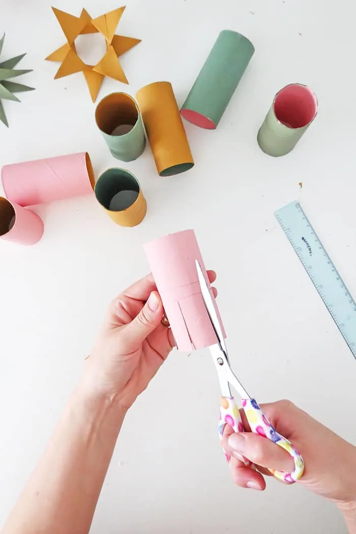 cut toilet roll to make christmas ornament