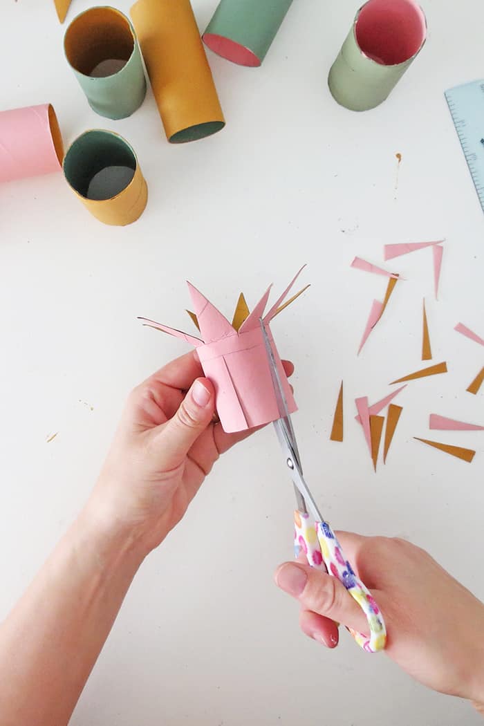 cut toilet paper roll to make christmas ornament