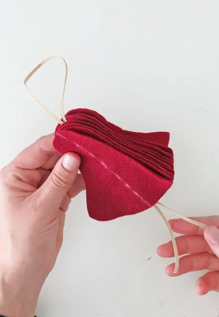 sewing a felt christmas ornament