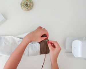 pass ribbon to make drawstring pillow cover