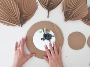 cut cardboard circle to make DIY mirror