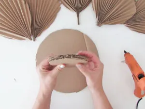 Glue cardboard to make DIY mirror