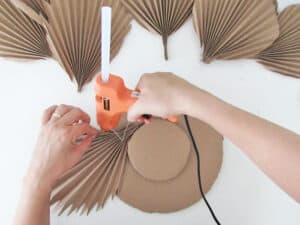 glue palms to make DIY mirror