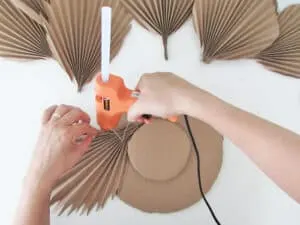 glue palms to make DIY mirror