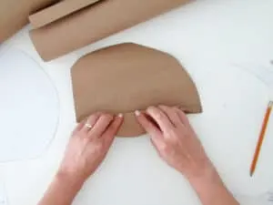 fold palm leaf to make DIY mirror