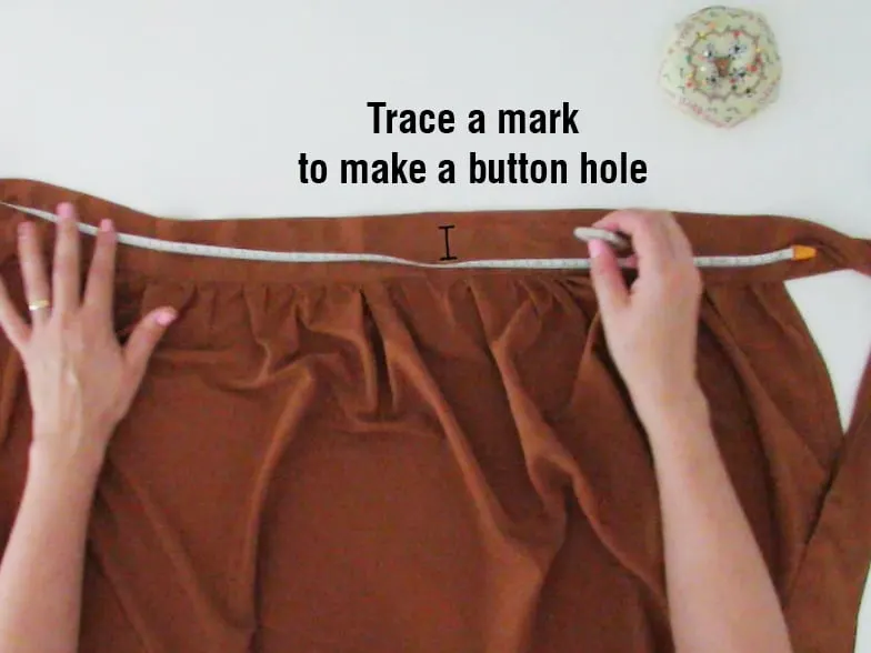 make a button hole to close the skirt
