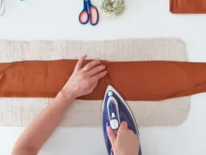 iron the fold to make the skirt belt