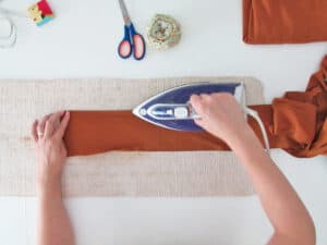 make double hem fold to make the skirt belt