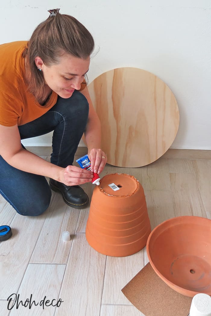 glue the planters to make the coffee table base