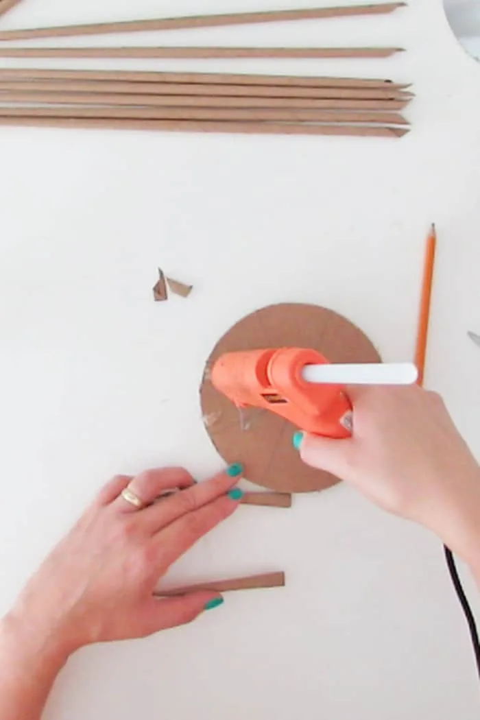 glue to paper on the cardboard