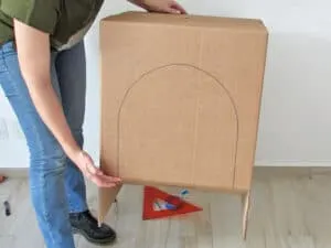 cut the arch to make the cardboard table