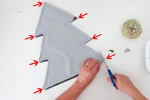 sewing a christmas shaped pillow