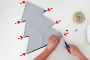 sewing a christmas shaped pillow