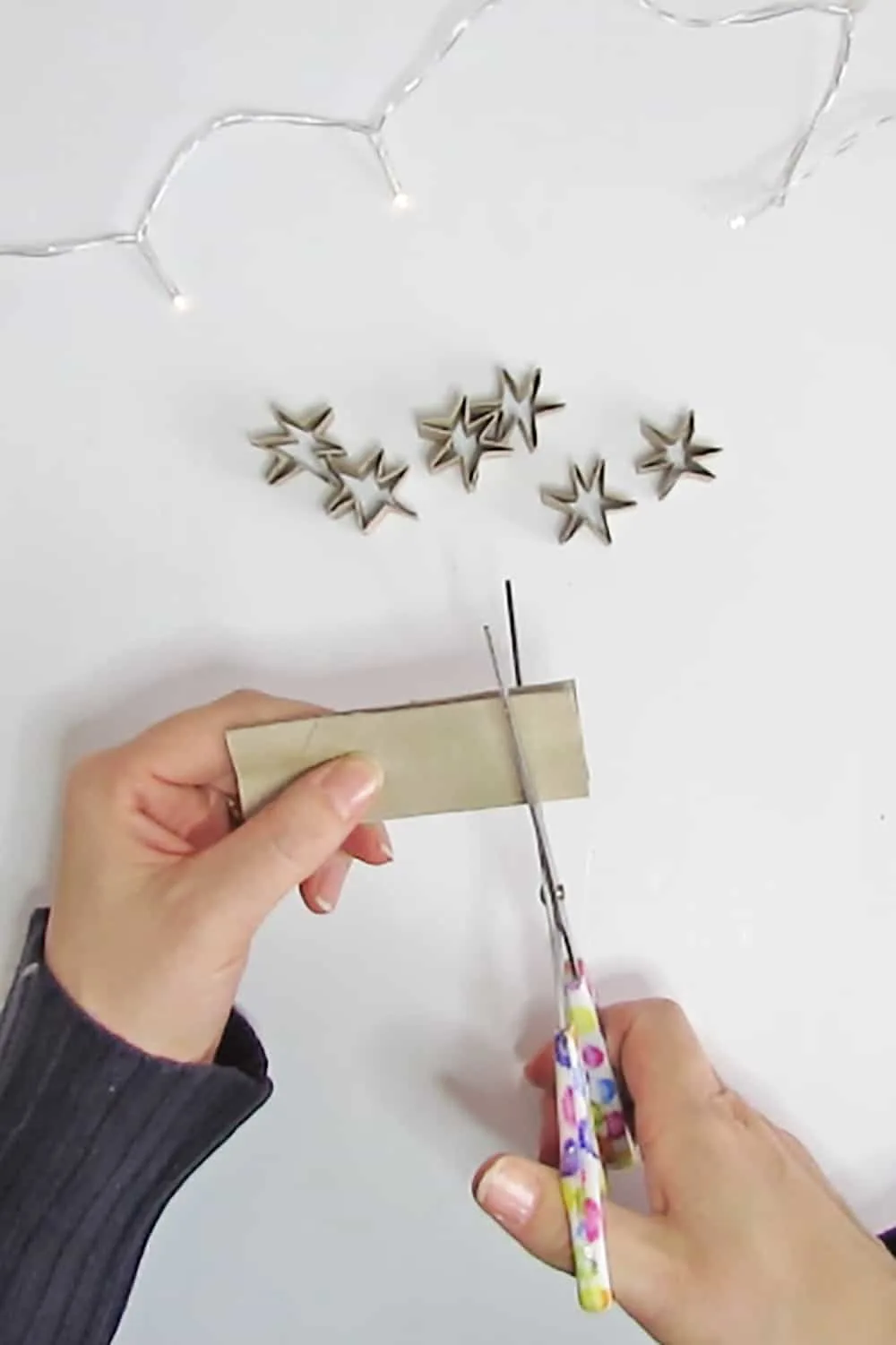 cut the toilet paper roll to make stars
