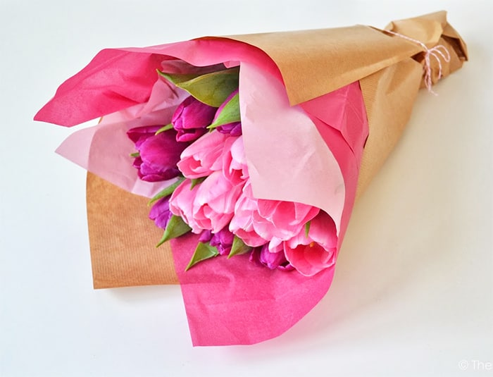 Wrap flowers with tissue paper