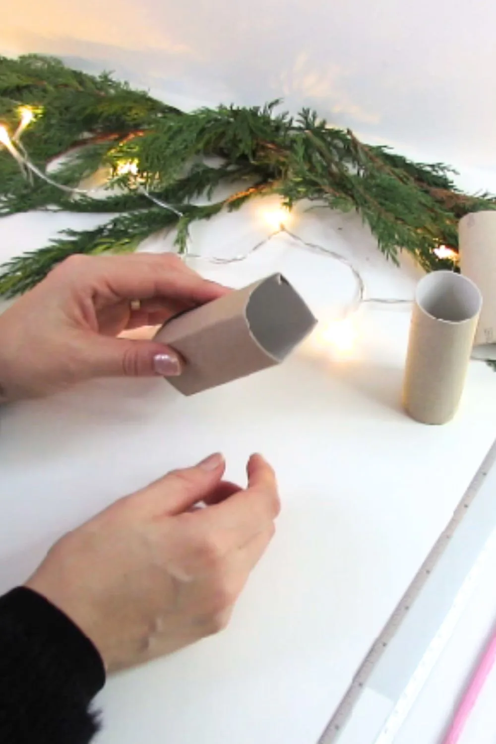make a square shape with the toilet paper roll