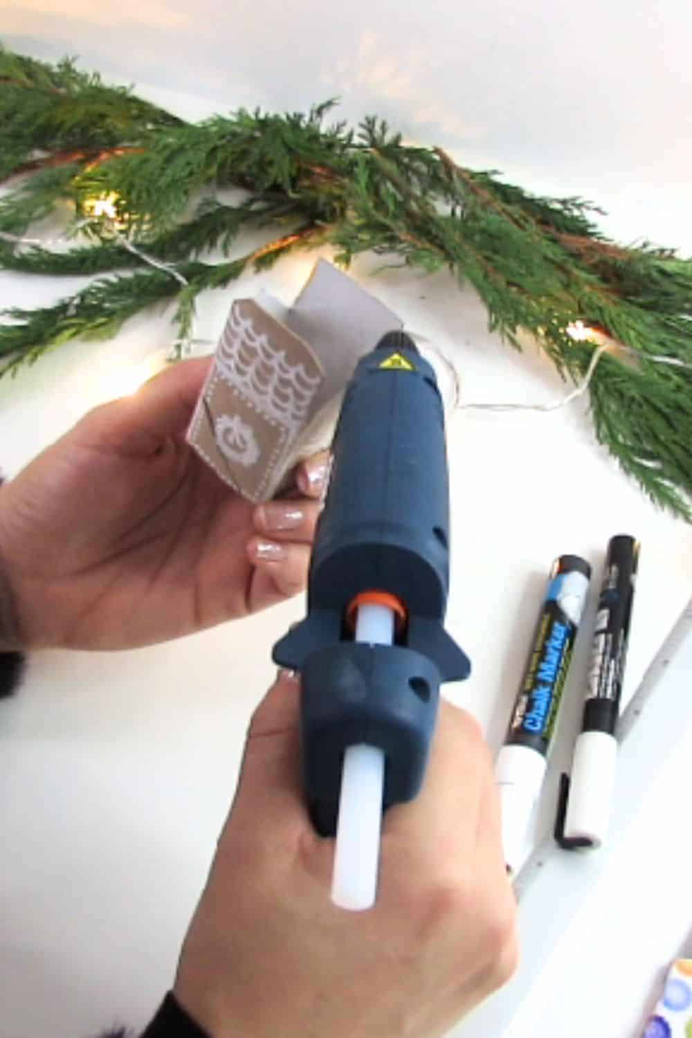 glue the house to make diy christmas village