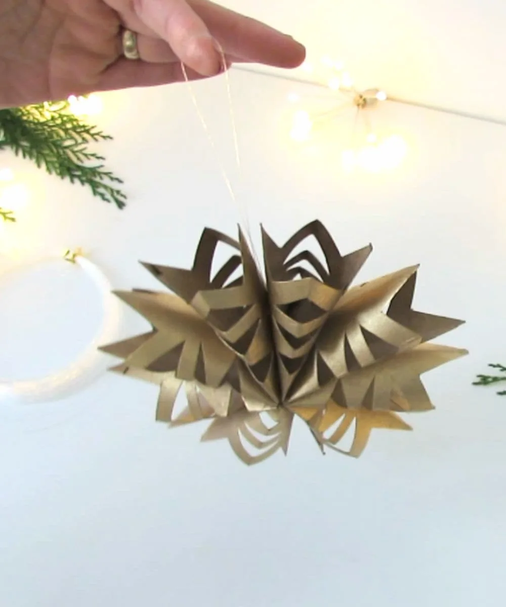 Make a toilet roll snowflake