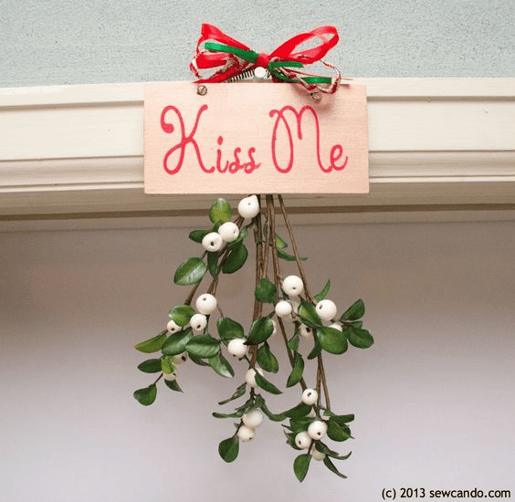 Mistletoe with Kiss me sign
