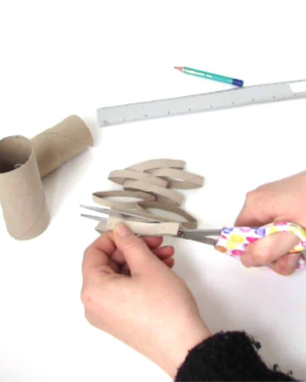 cut toilet paper rolls to make flowers