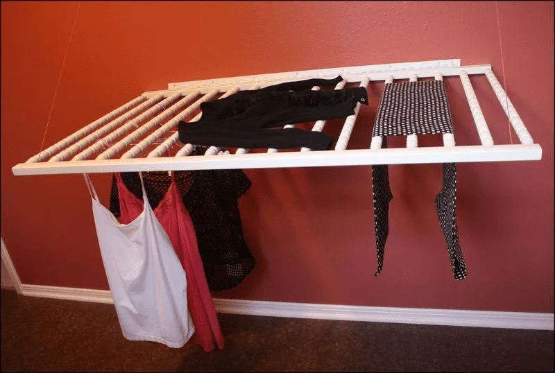 recycled curby into clothes drying rack