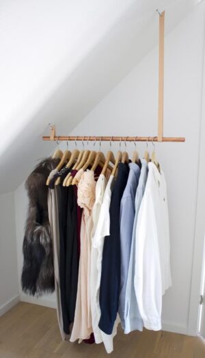 diy wall clothes rack for slop ceiling