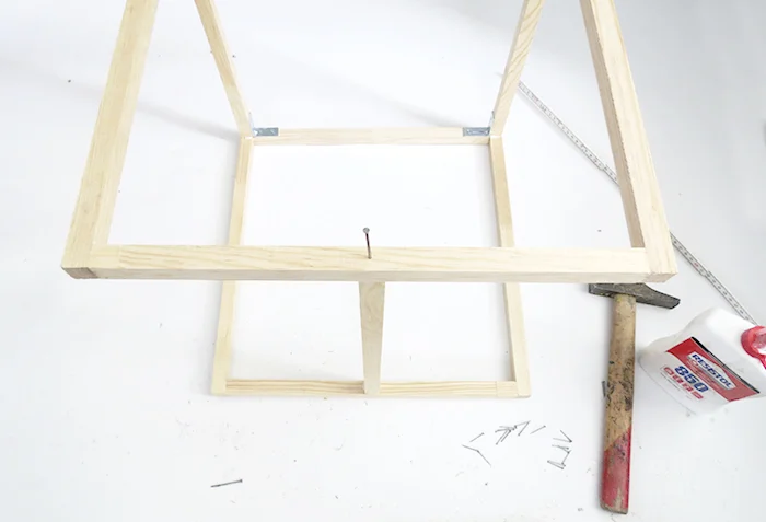 nail the wood dowels to make the table foot