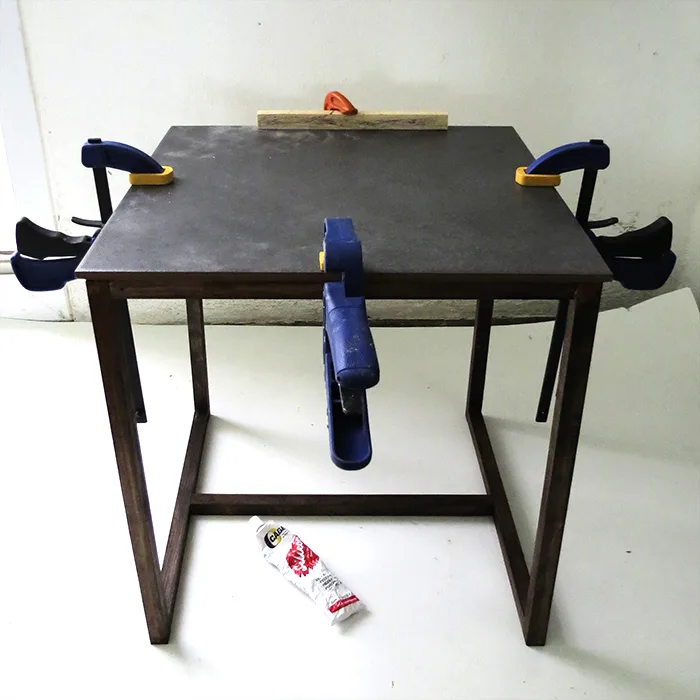 glue the tile on the table
