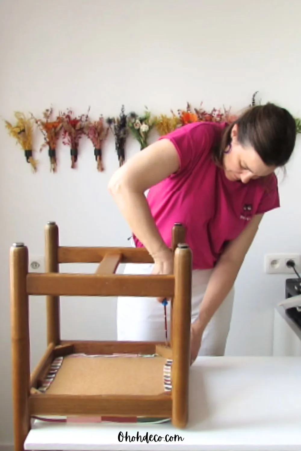 screw back the seat to the chair frame 