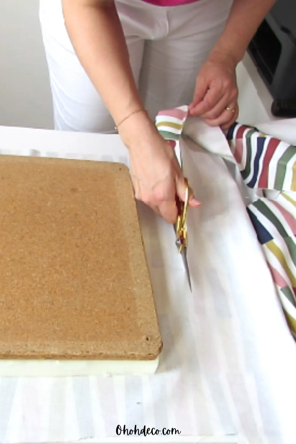 cut the fabric to cover the chair seat 