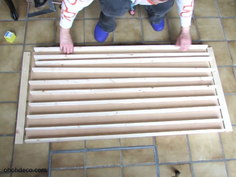 organize the dowel to create the toy car display shelf