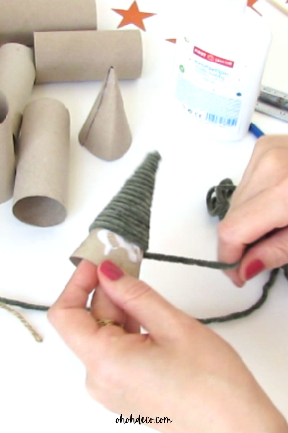 wrap the cardboard with yarn