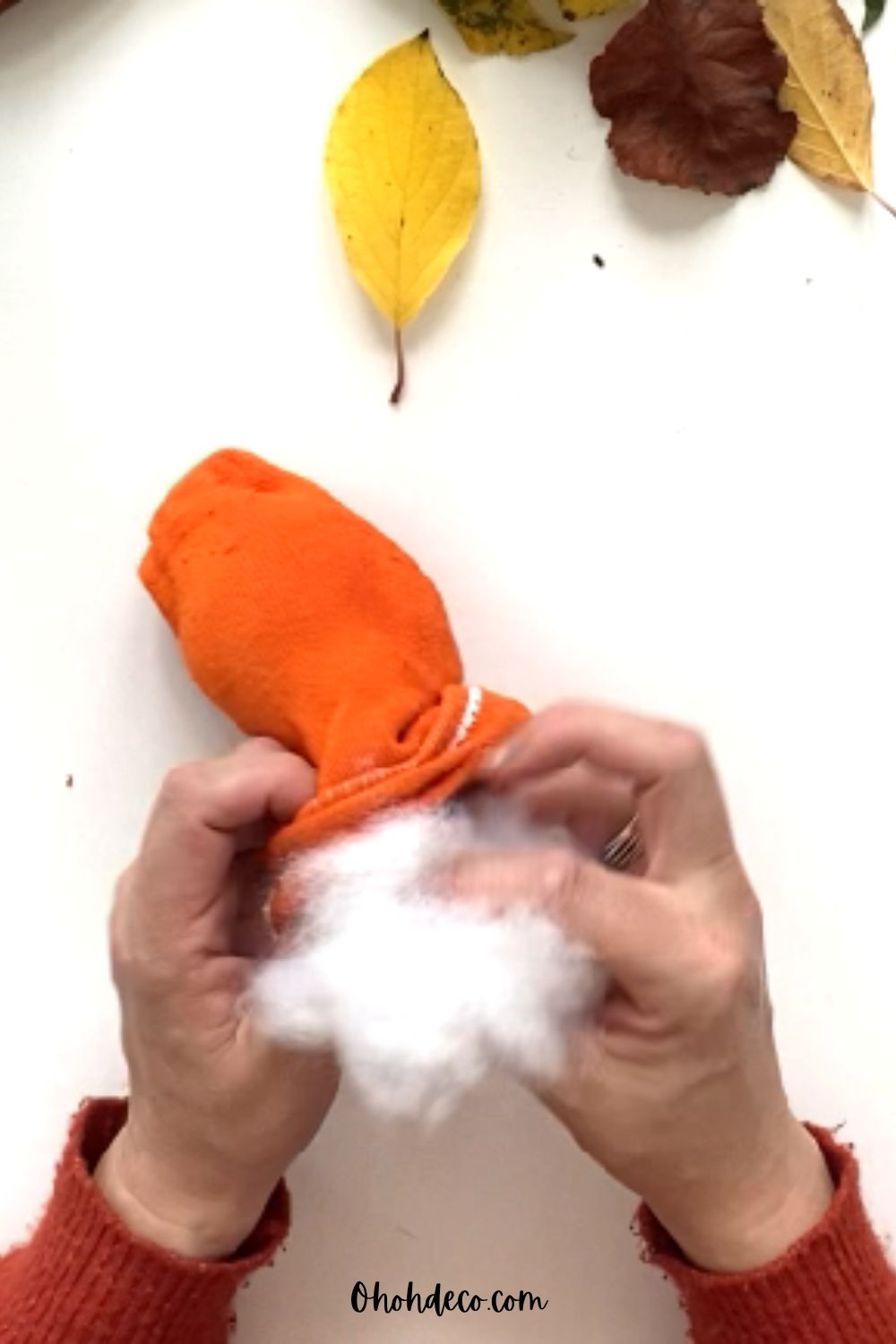fill the socks to make the mini pumpkins