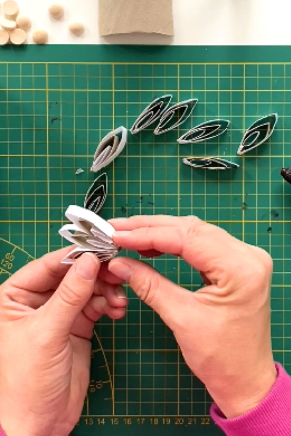 glue the toilet paper roll to make a flower