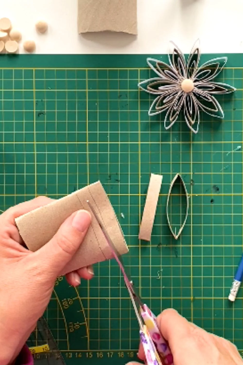 cut toilet paper roll to make leaf