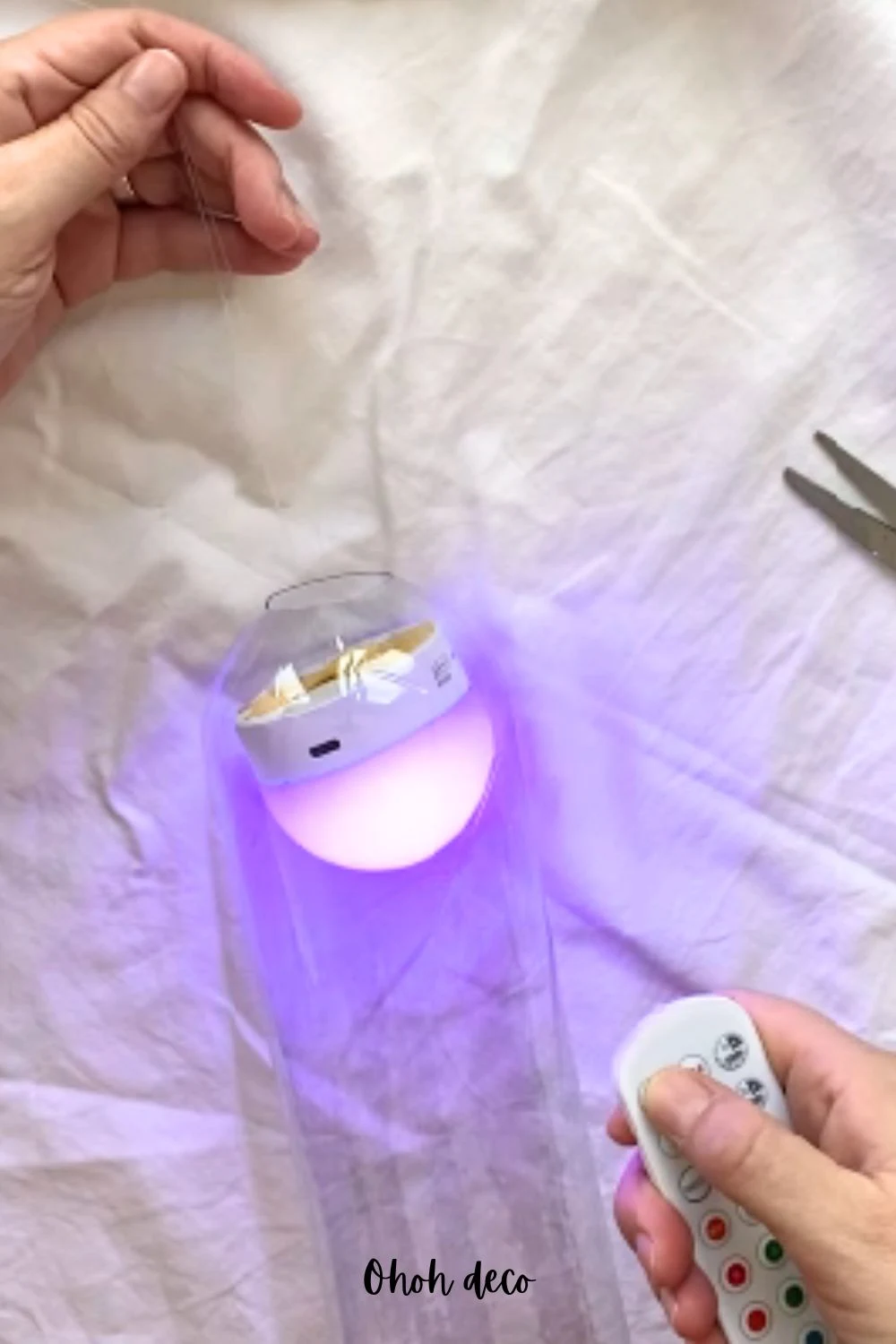 slide the LED light inside the bottle