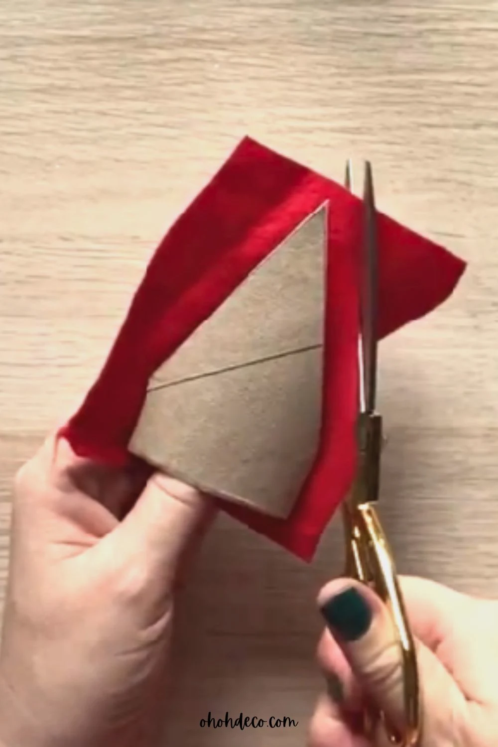 cut cradboard roll into santa hat